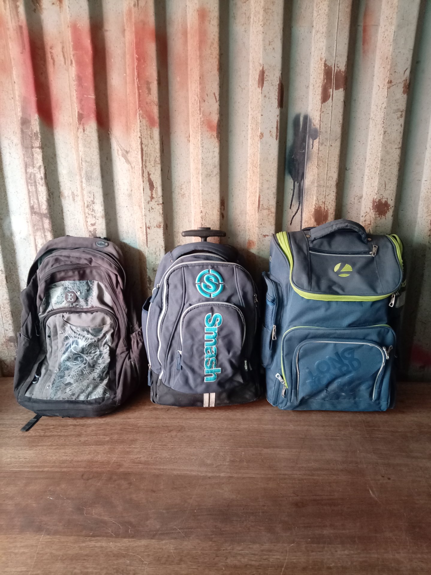 Lot of 3 Used Backpacks (mixed) — includes wheeled ‘Smash’ bag with damaged wheels