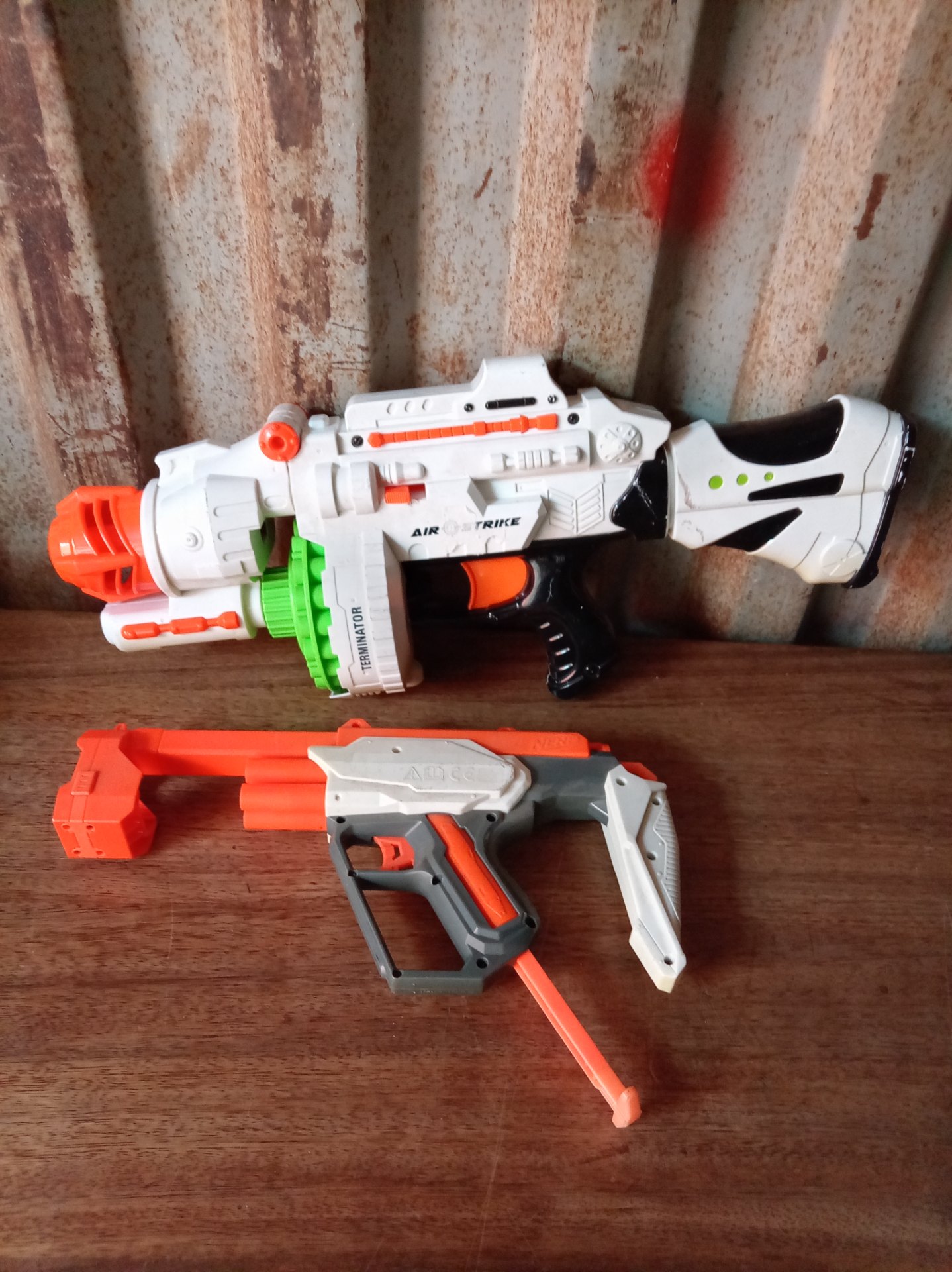 Lot of 2 Toy Dart Blasters — White ‘Air Strike/Terminator’ + Grey/Orange (orange part stamped NERF) — used, worked last time