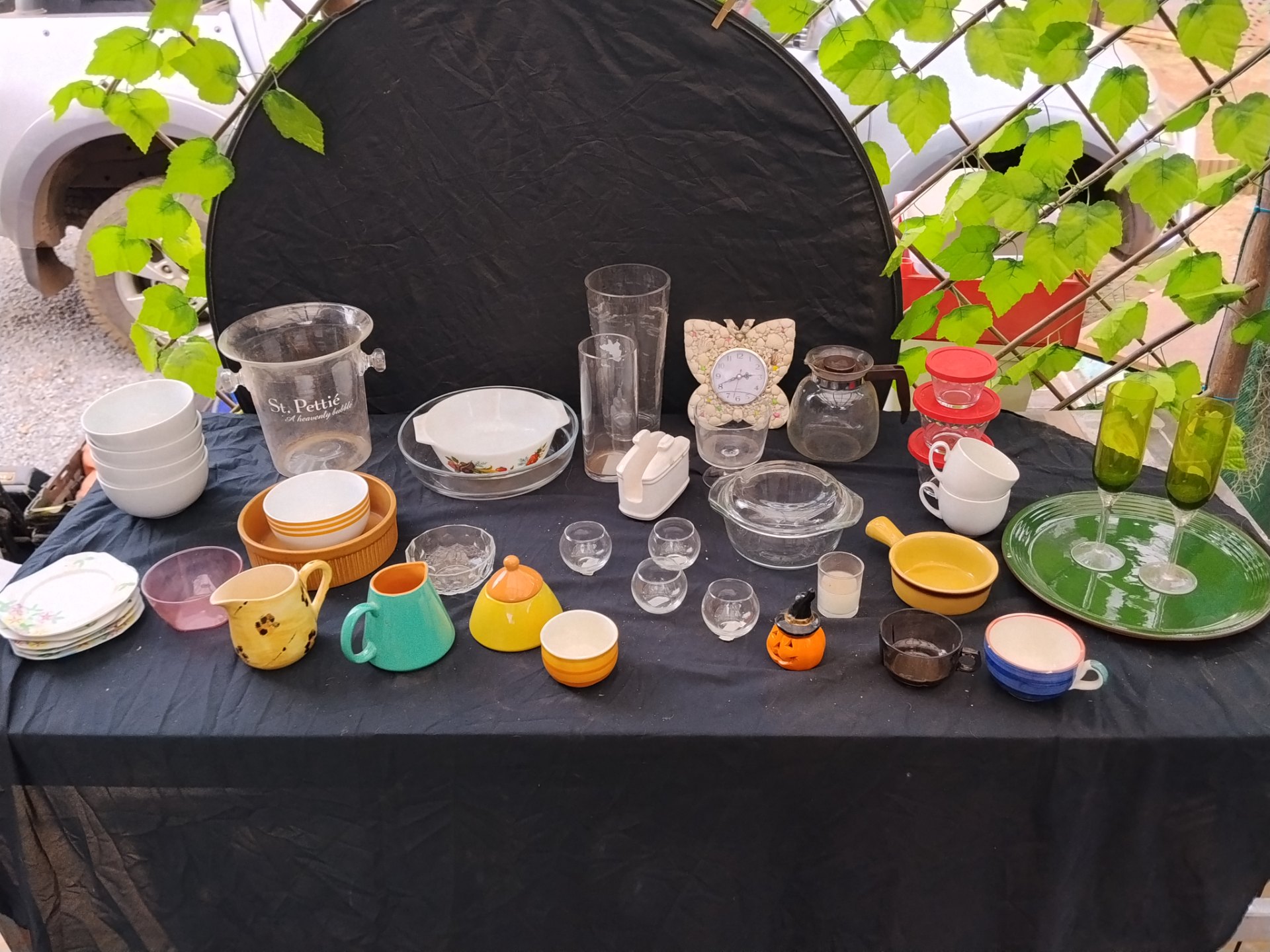 Mixed kitchen & glassware lot — St. Pettie ice bucket, milk-glass bowl, green flutes, shell clock & more (used, some chips)