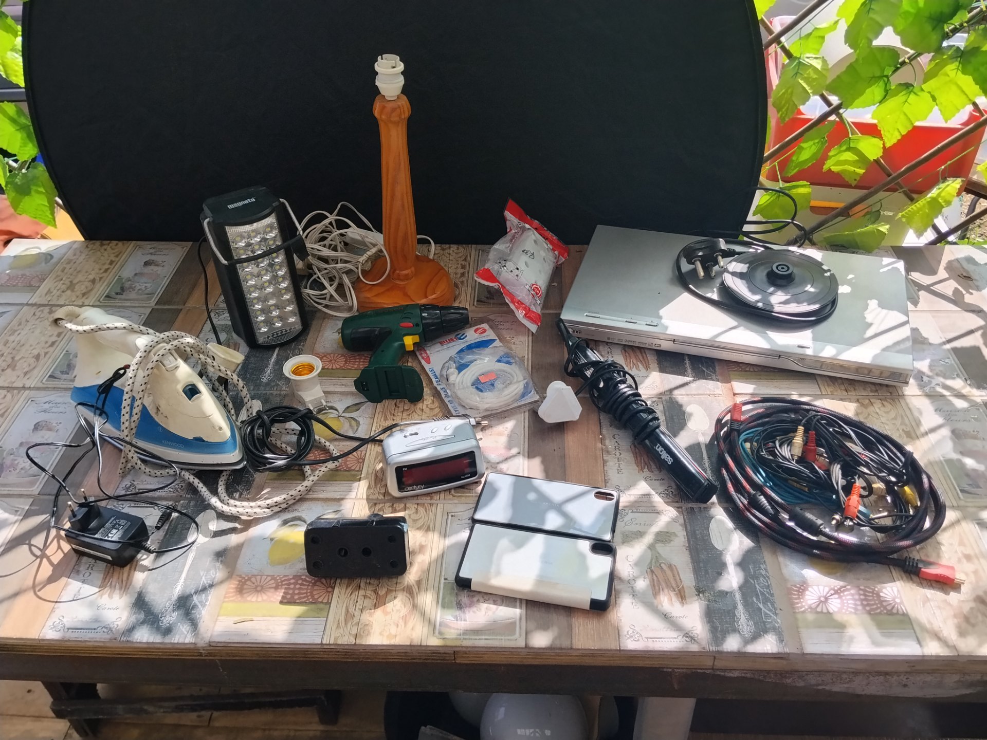 Mixed lot: Used small household electronics & accessories — LG DV9723P DVD, Kenwood iron, Bosch drill body, lamp base, cables & cases (untested)