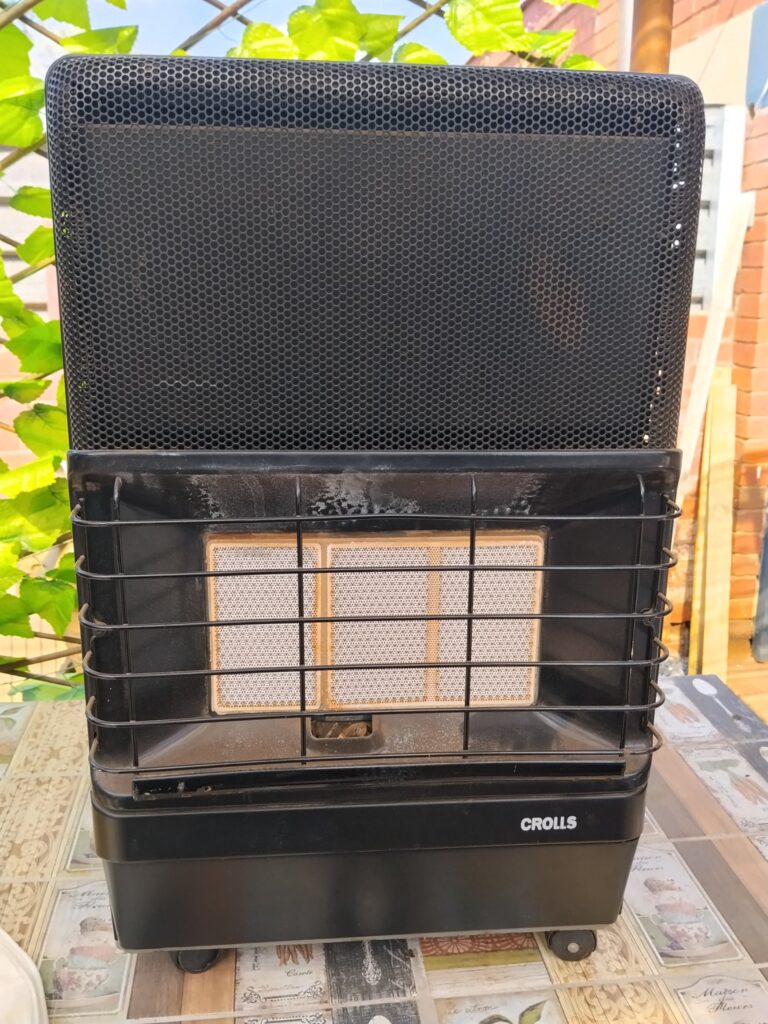 Crolls portable gas space heater — ceramic burner, regulator & hose included (used, works with faults)