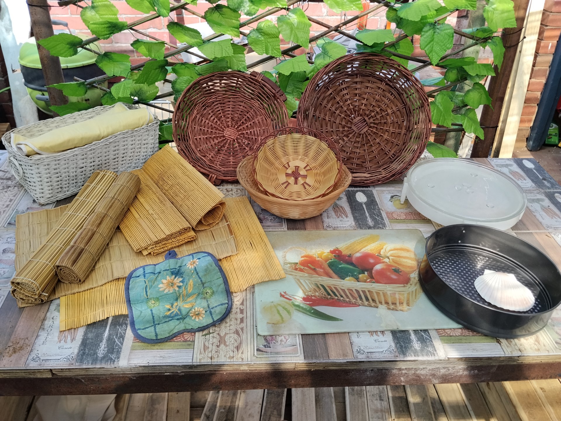 Assorted Kitchen Wicker & Bamboo Lot — baskets, bamboo mats, chopping board & baking tins