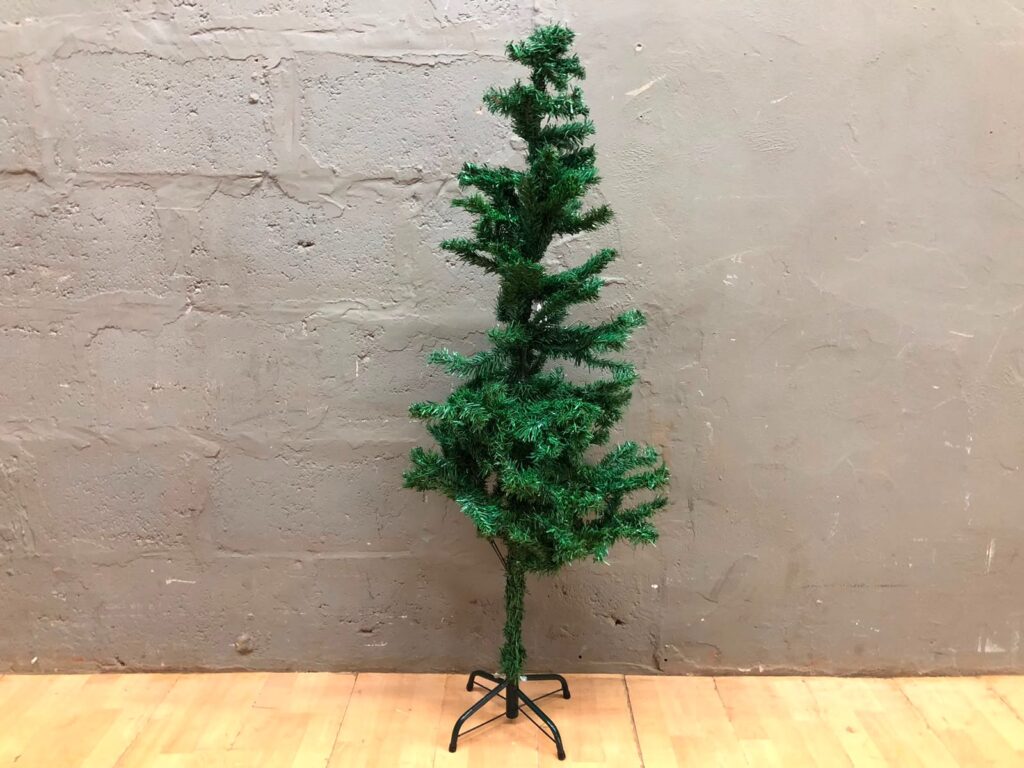 Small 131 cm Artificial Christmas Tree on Metal Stand — Fair, Sparse Foliage, No Lights