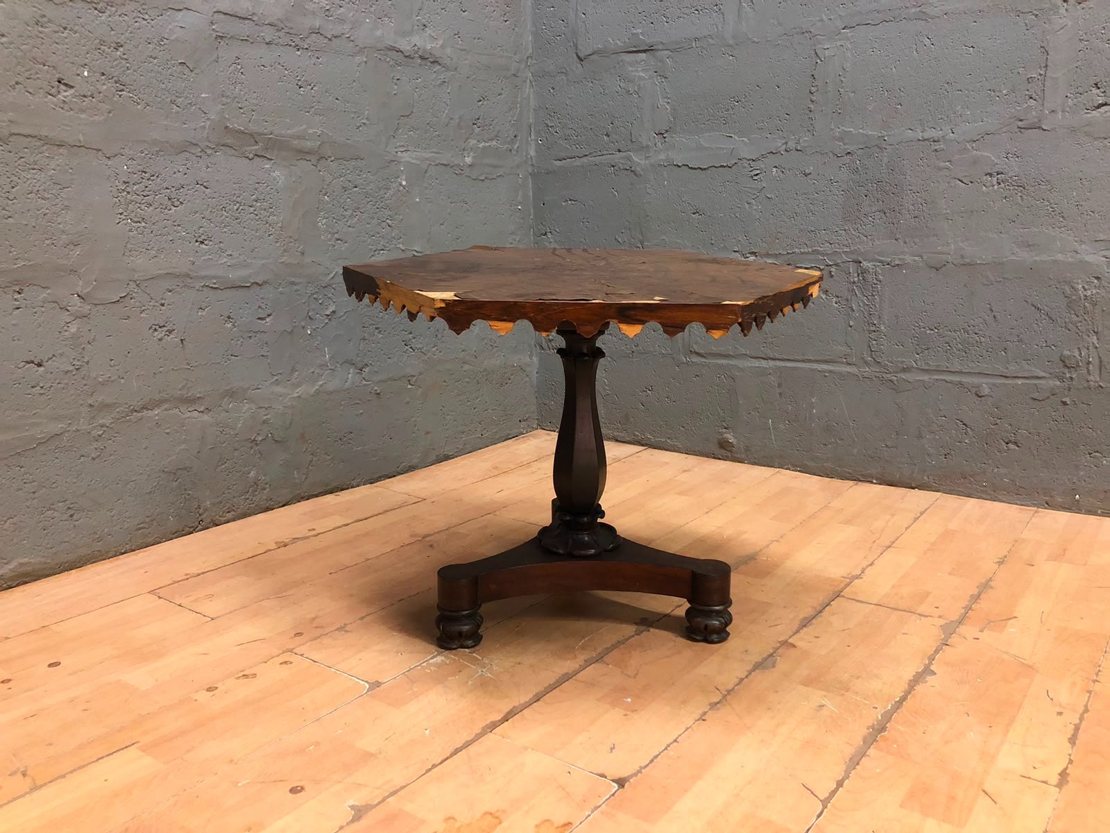 Hexagonal veneered occasional / side table with turned pedestal & tripod base — top damaged