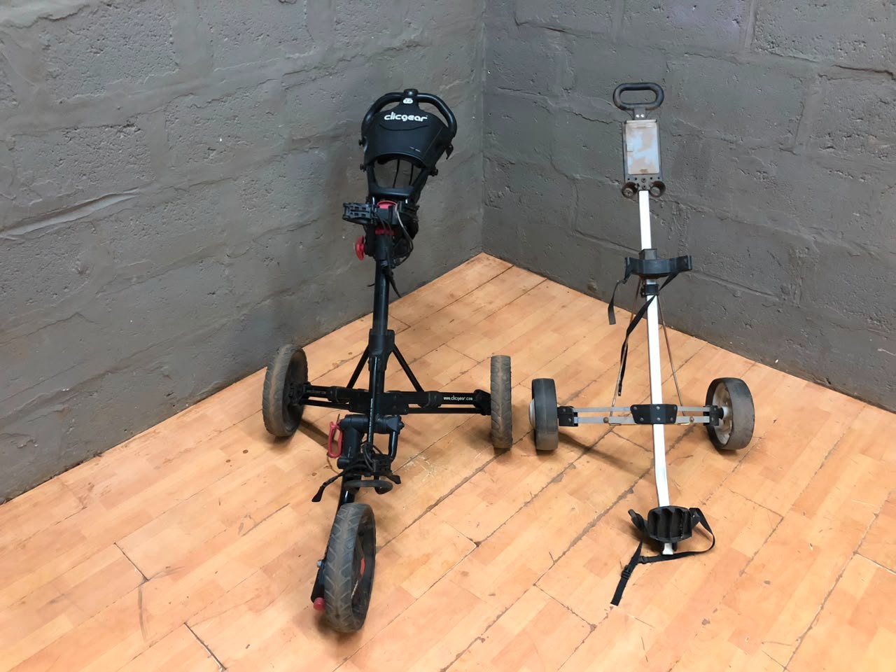 Pair of Golf Push Trolleys — Clicgear Model 3.0 (black) + unbranded silver trolley, used
