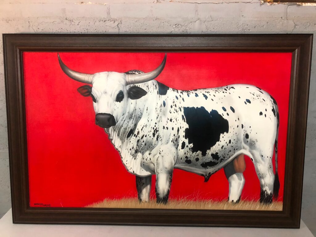 Large signed oil-on-board painting ‘Bull’ by Nicholas Shabangou — bold red field, original frame