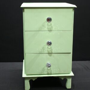 Mint-green painted small chest of drawers / jewellery box — 4 drawers, crystal-style knobs, visible paint chips
