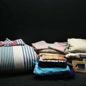 Mixed bedding and towels lot — striped duvet/cover, folded sheets, assorted towels plus framed picture & boxed 'Stitch Passport Cover' (used)
