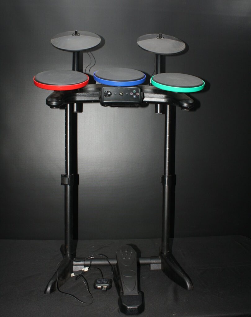 PlayStation 3 Rock Band drum kit — pads, cymbals, pedal, controller & USB dongle (Untested)