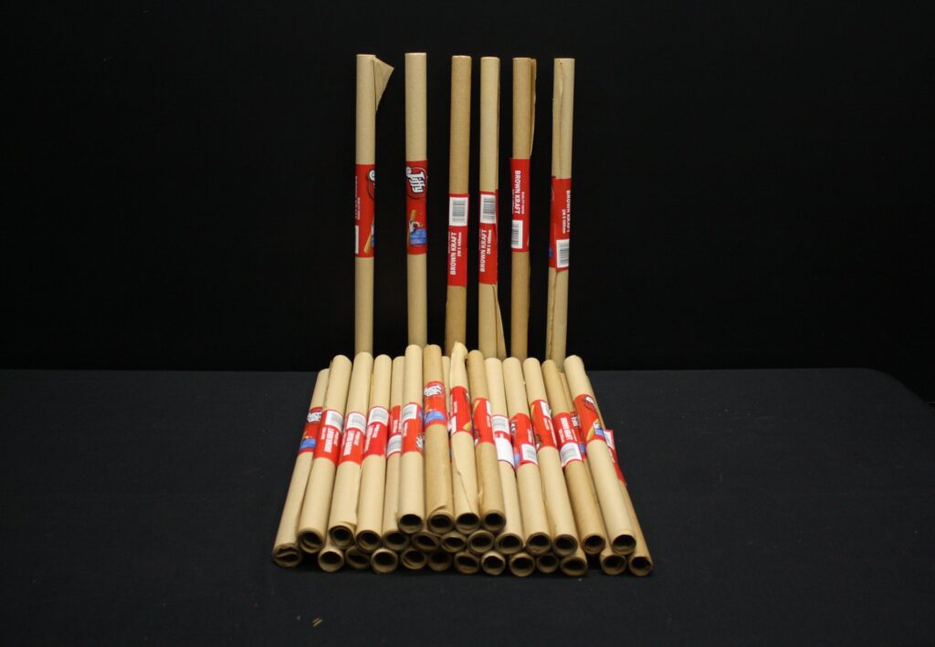 Bulk lot approx 20 x Brown Kraft Paper Rolls — labelled 2M x 480mm (some dented / torn labels)