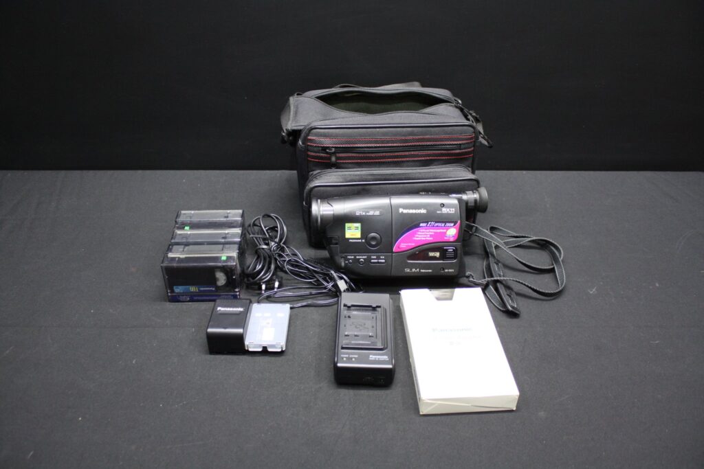 Panasonic NV-RX11 VHS-C camcorder with charger, battery, boxed cassette adaptor, 4 VHS-C tapes, manual & carry bag (Untested)