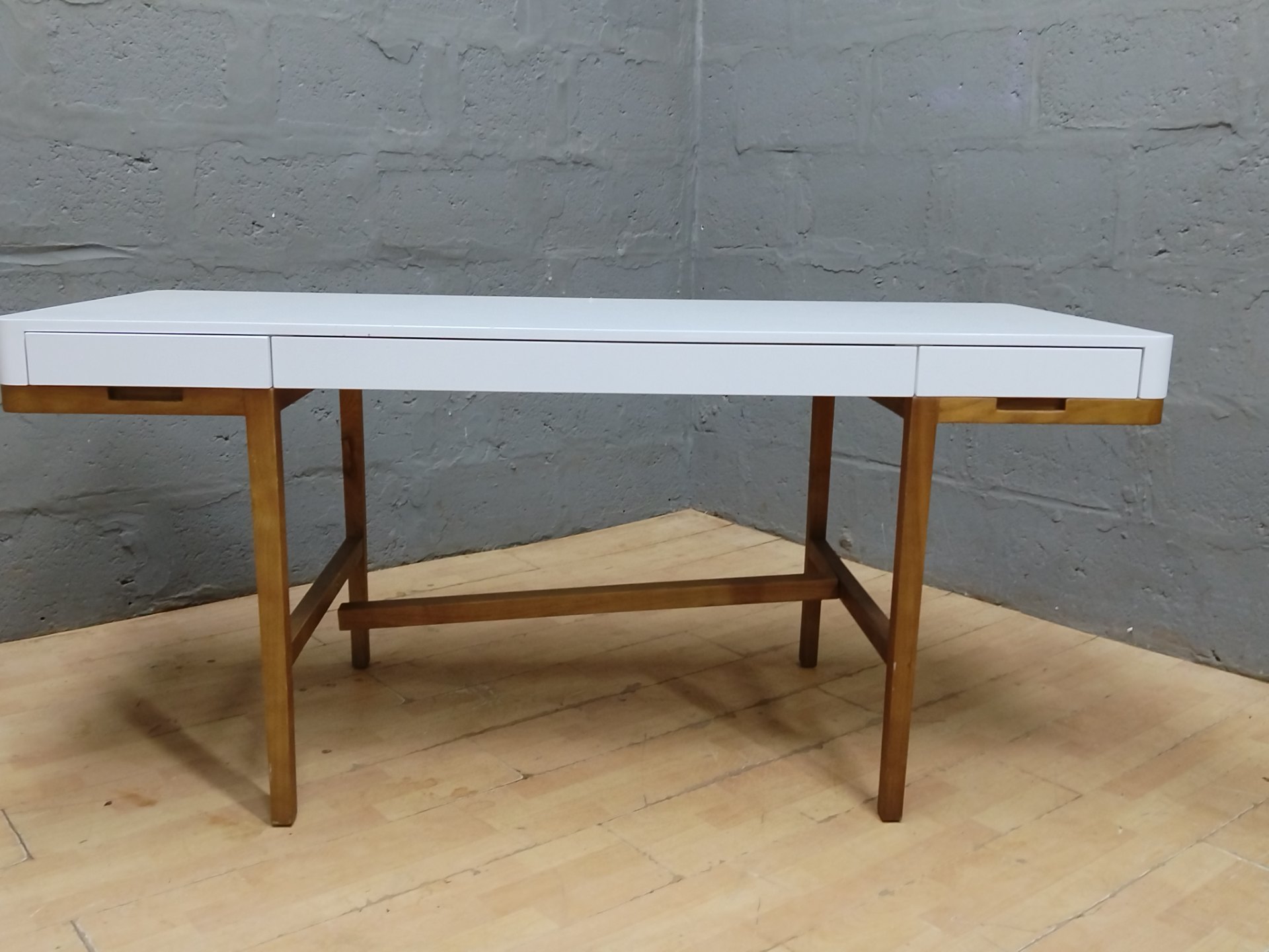White-top console / desk on wooden trestle base — 3 drawers, 166 × 70 × 76 cm