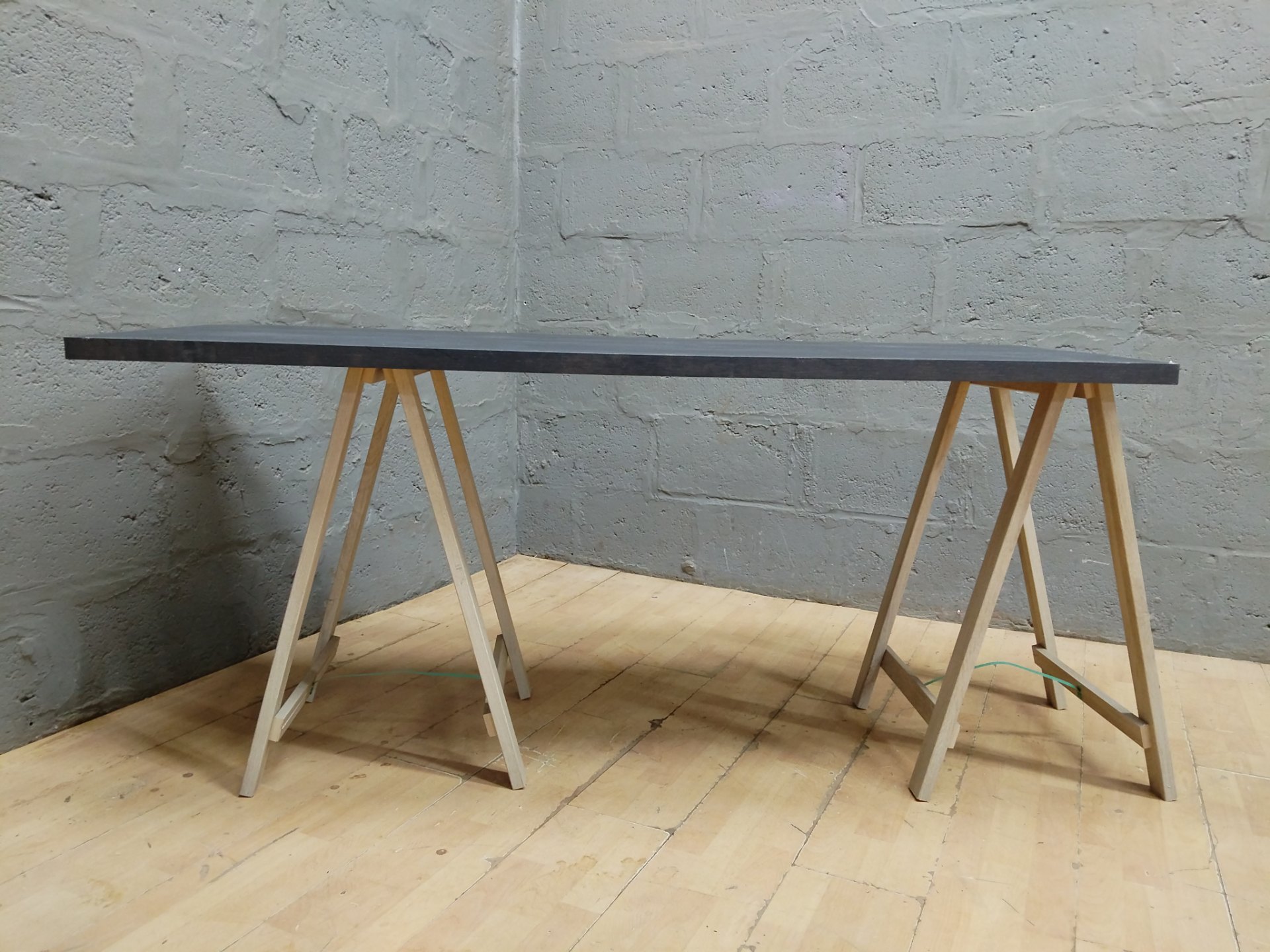 Dark laminate tabletop panel 167 × 61 × 77 cm — fair condition, edge chips