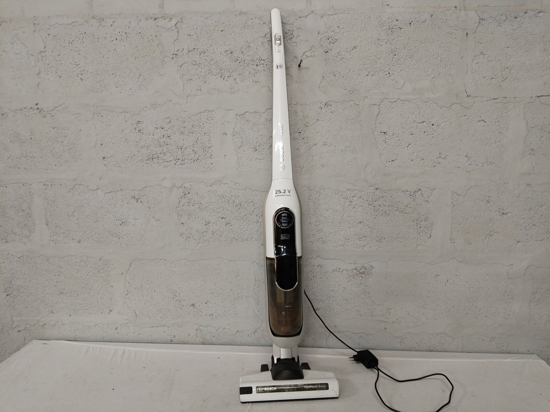 Bosch 25.2V LithiumPower SensorBagless Cordless Stick Vacuum — charger included; battery needs replacement