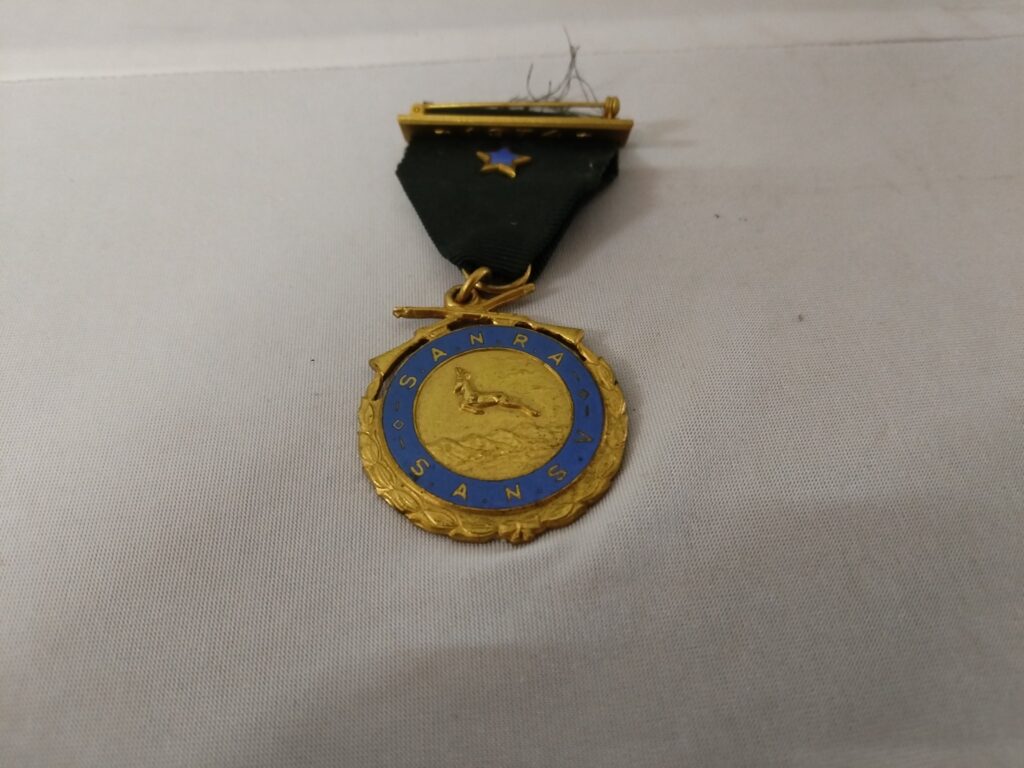 Commemorative Medal on Green Ribbon — Suspension Bar Stamped 1974, Blue Enamel Ring