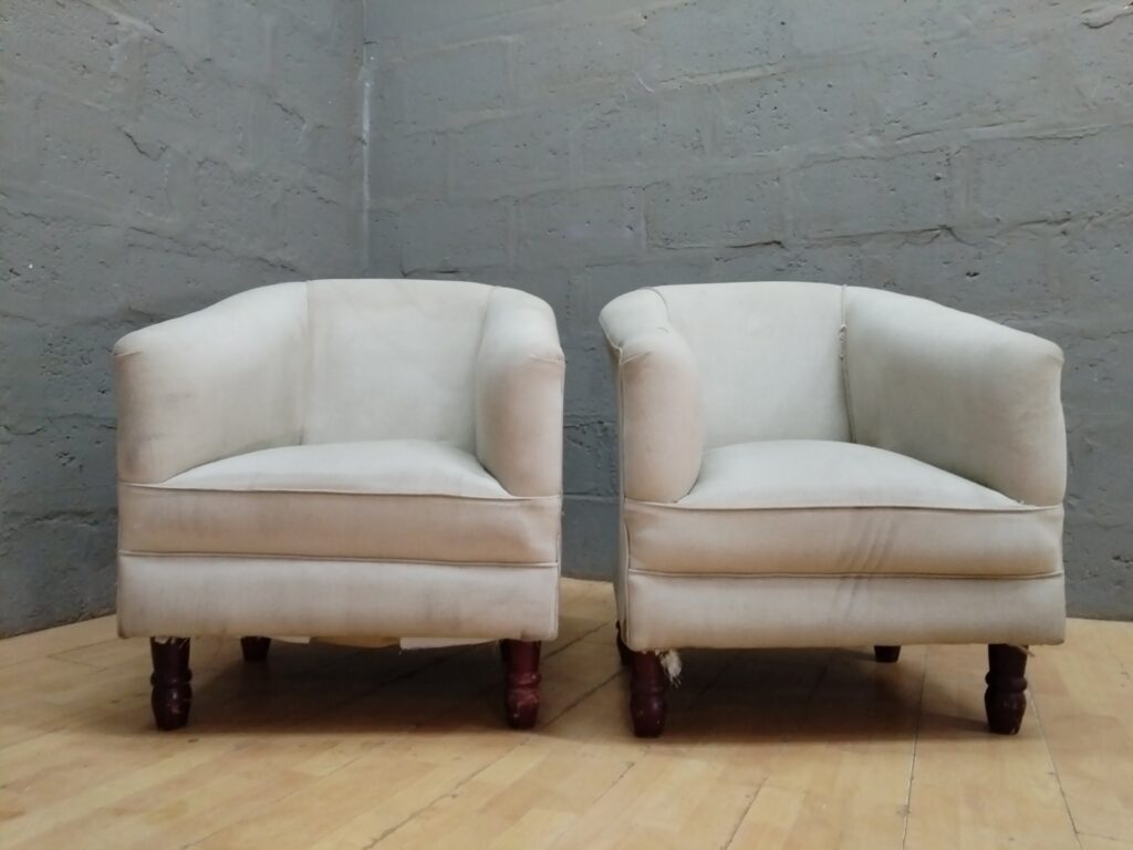 Pair of Beige Upholstered Tub / Club Chairs — Used, Stains & Tears, Turned Wooden Legs (71 x 65 x 87cm each)