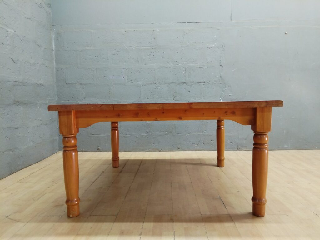 Solid Oregon Pine dining table with turned legs — 150 x 148 x 79cm (cracked top)