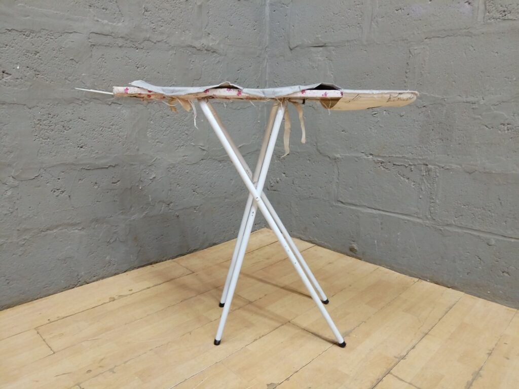 Folding Ironing Board with Iron Rest — 102 x 82 cm (Cover Worn / Tears)