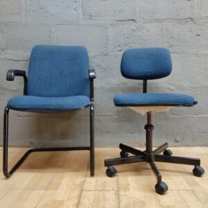 Pair of blue office chairs — cantilever visitor chair + height-adjustable swivel on castors