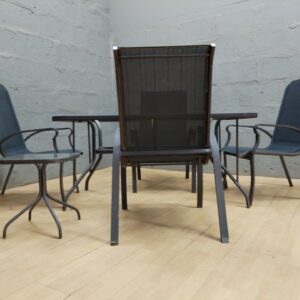 Outdoor 5-piece patio dining set — glass-top table, 4 sling chairs + small side/footstool