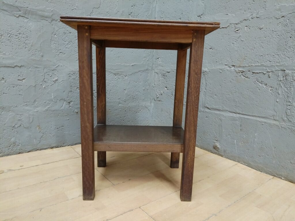 Small two-tier wooden side table / plant stand — used, stable with surface wear
