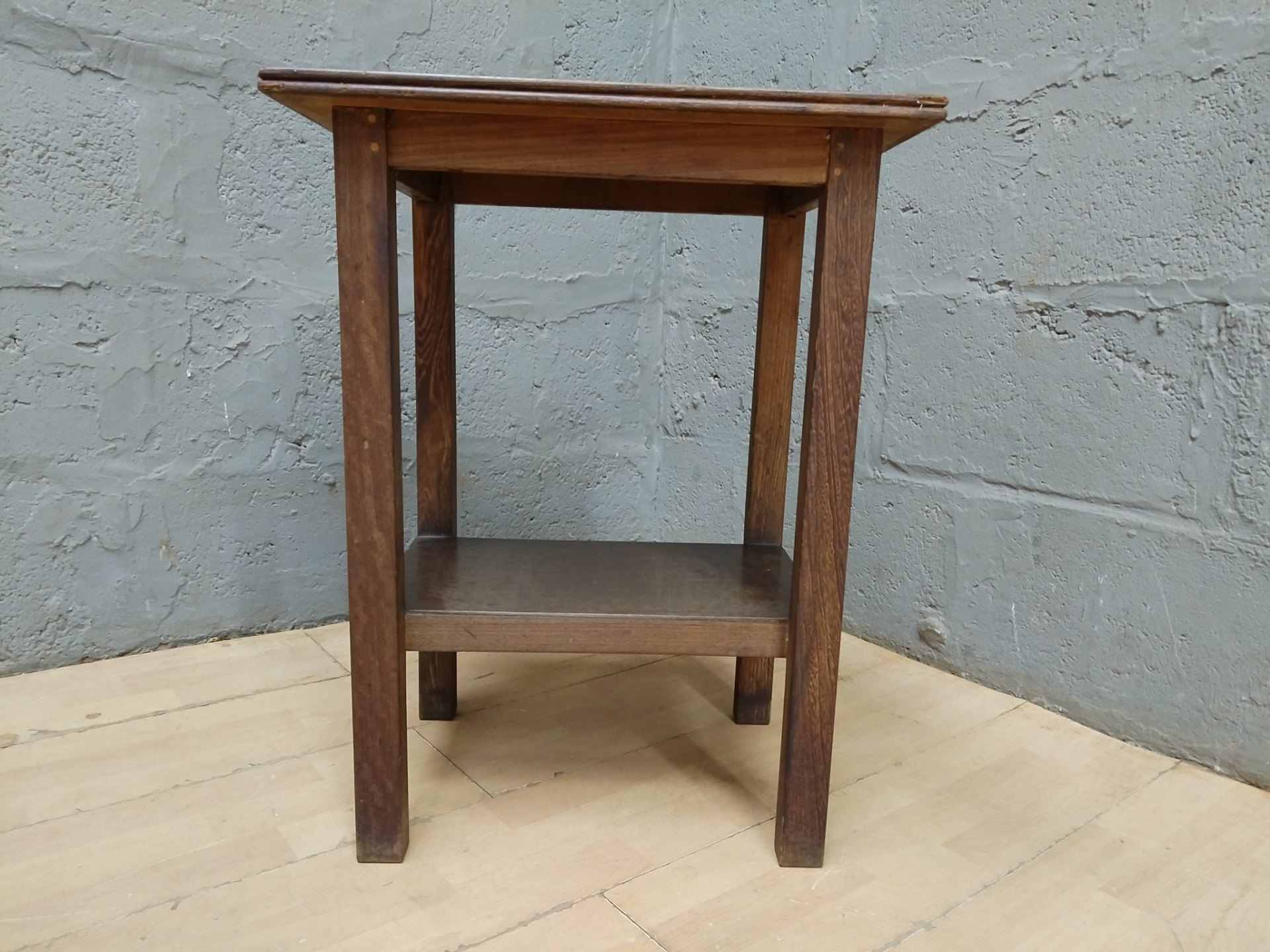Small two-tier wooden side table / plant stand — used, stable with surface wear