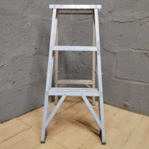 Aluminium folding A‑frame step ladder — top platform 85 cm, workshop-used with paint splatters