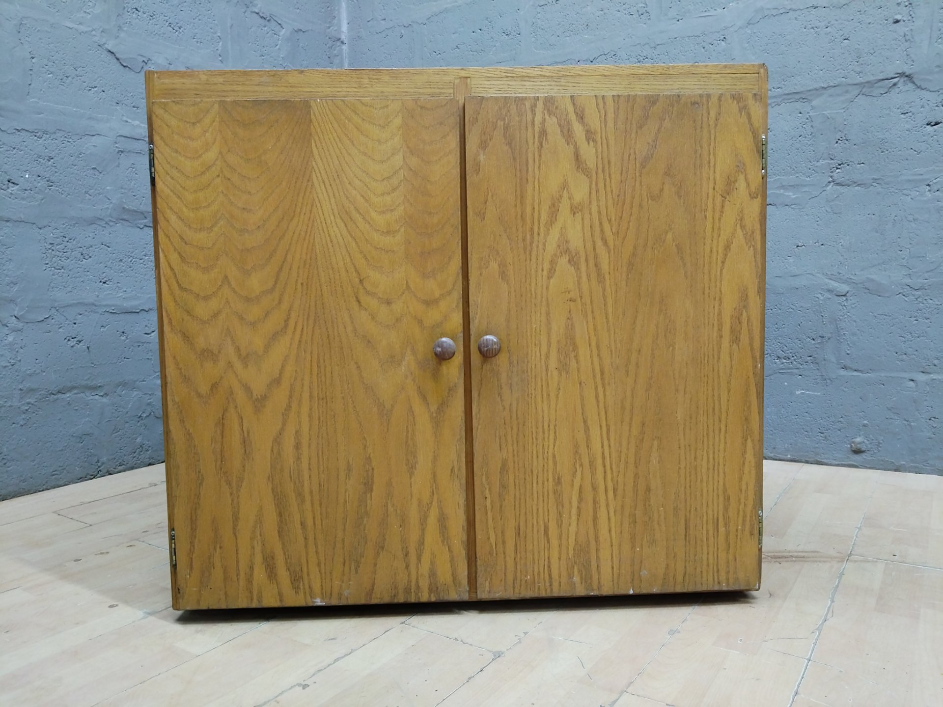 Small Solid Wood Two‑Door Storage Cabinet with Eight Internal Compartments – Used