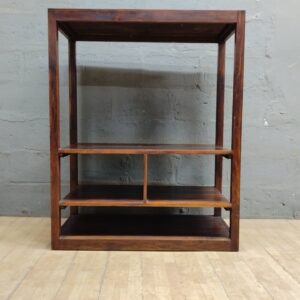 Open wooden shelving unit / bookcase — multi-shelf, fixed shelves, visible surface wear