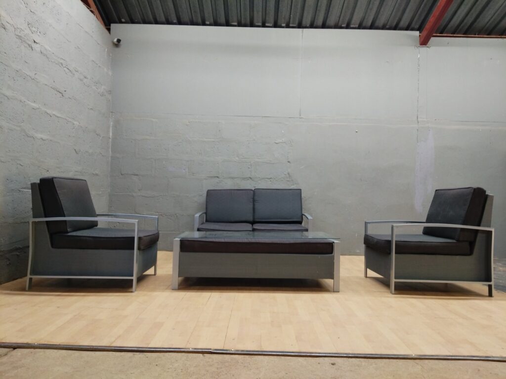 4-piece lounge seating set — 2‑seater loveseat, 2 armchairs + glass-top coffee/ottoman (grey, metal frame)