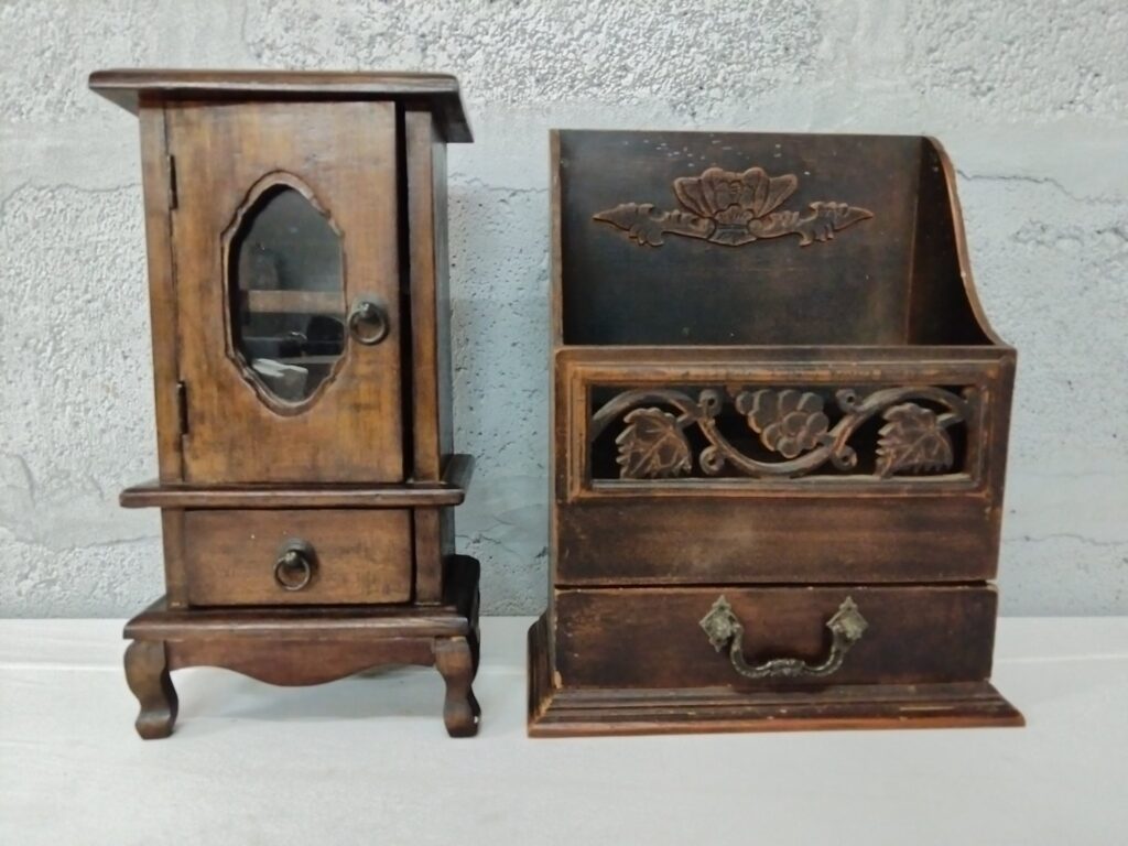 Pair of small carved wooden organisers — glass-front cabinet + open floral organiser, drawers