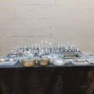 Bulk mixed glassware & bakeware lot – approx. 70 pieces (glasses, bowls, trays, branded pint glasses)