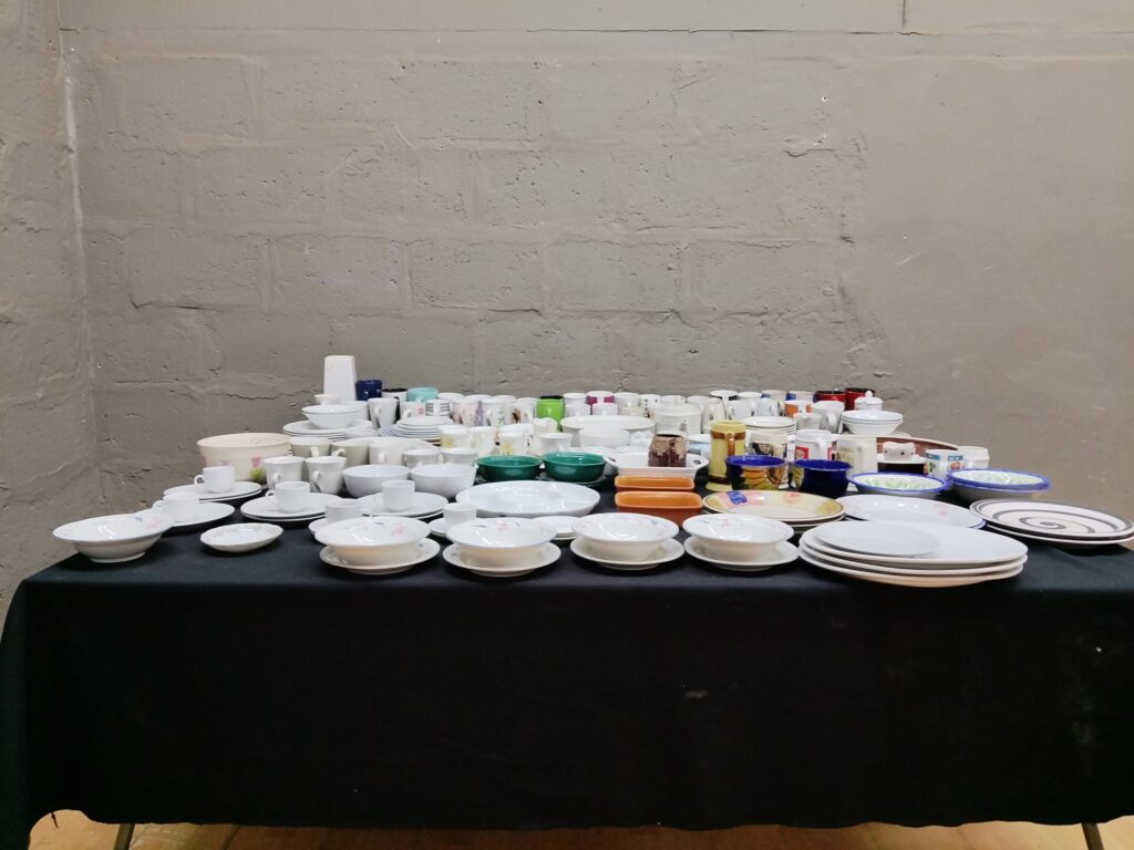 Mixed ceramic tableware lot — approx. 105 pieces (plates, bowls, cups, mugs, serving & serving dishes)