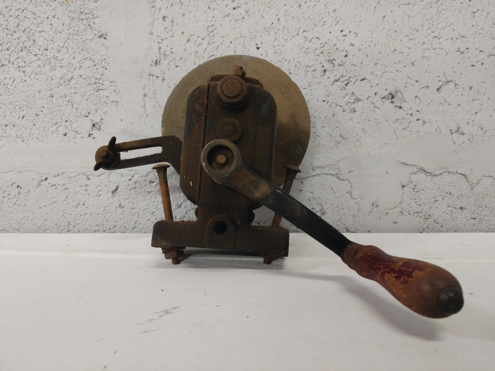Vintage Henry Baker hand-crank bench grinder / wheel sharpener – cast-iron clamp mount