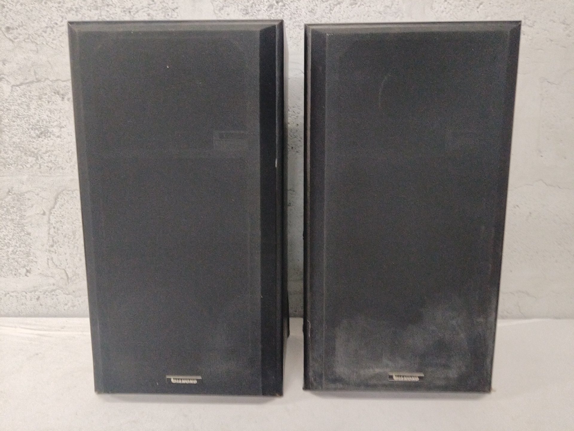 Pair of Diamond passive bookshelf speakers – front grilles fitted, rear spring-clip terminals