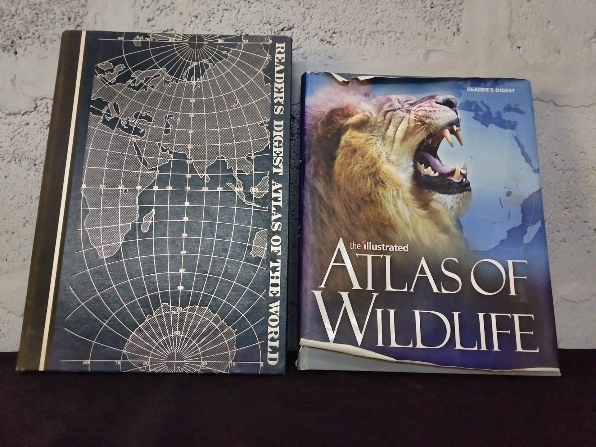 Pair of Reader’s Digest Hardback Atlases — Atlas of the World & Atlas of Wildlife (used, dust-jacket damage)