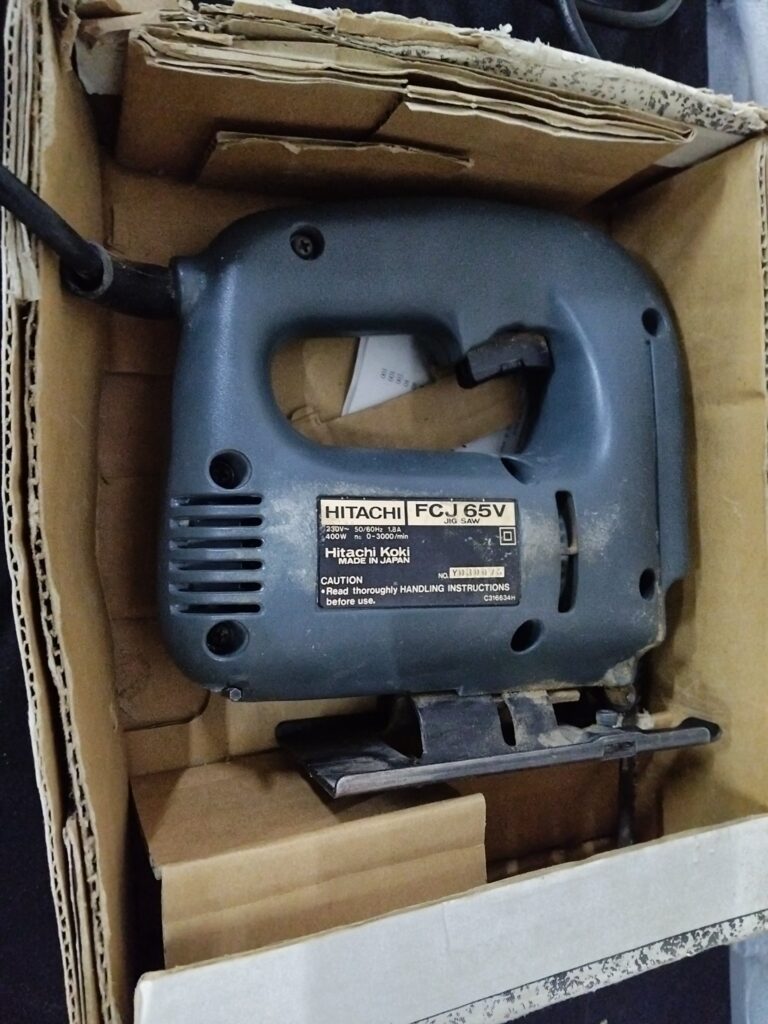 Hitachi FCJ65V 65mm Jigsaw — tested & working, cord + original box/manual, dusty with surface rust, no blades