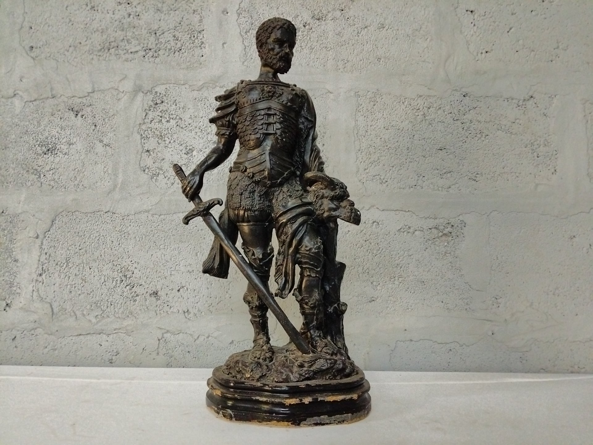 Armoured Warrior Decorative Statue (plaster/chalkware) on Original Oval Wooden Base — Sword & Defeated Head