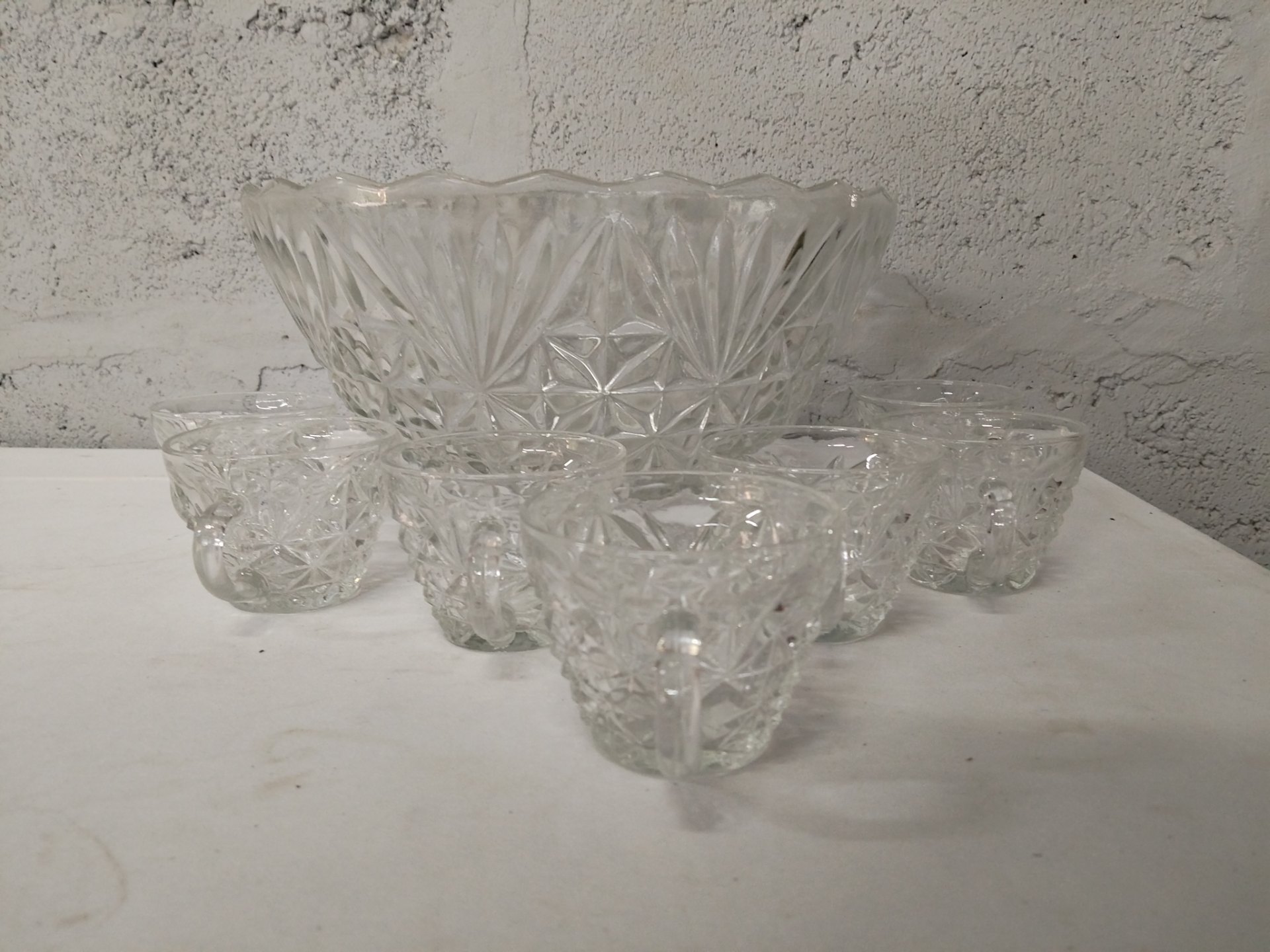 Pressed glass punch bowl set – large scalloped bowl + 7 handled cups (cut/pressed pattern)