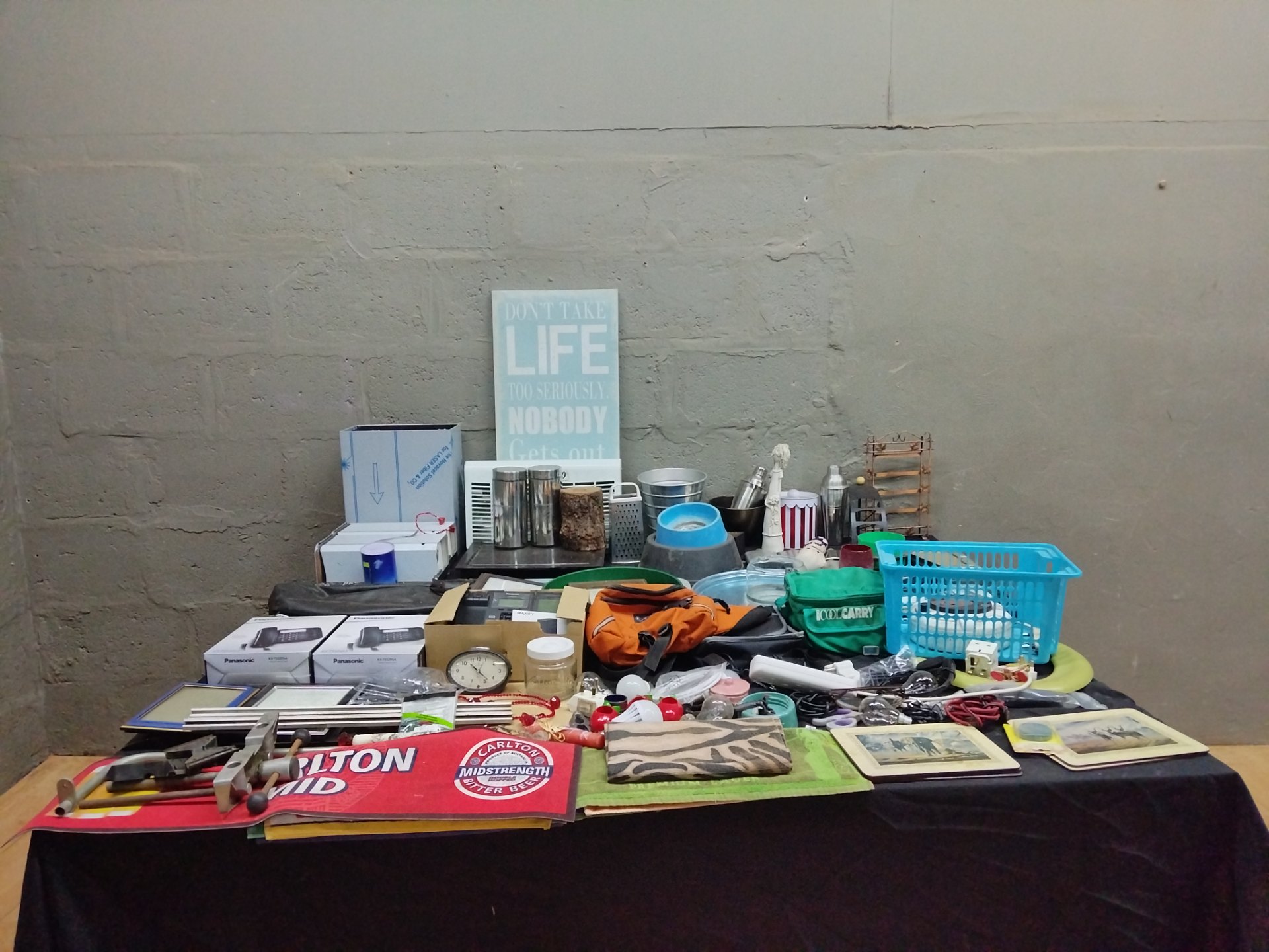 Mixed household lot — boxed Panasonic phones, kitchenware, tools, frames & assorted small items (table-top)