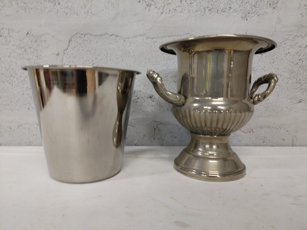 Pair of silver‑plate wine / champagne coolers — plain bucket (rim crack) + decorative two‑handled urn