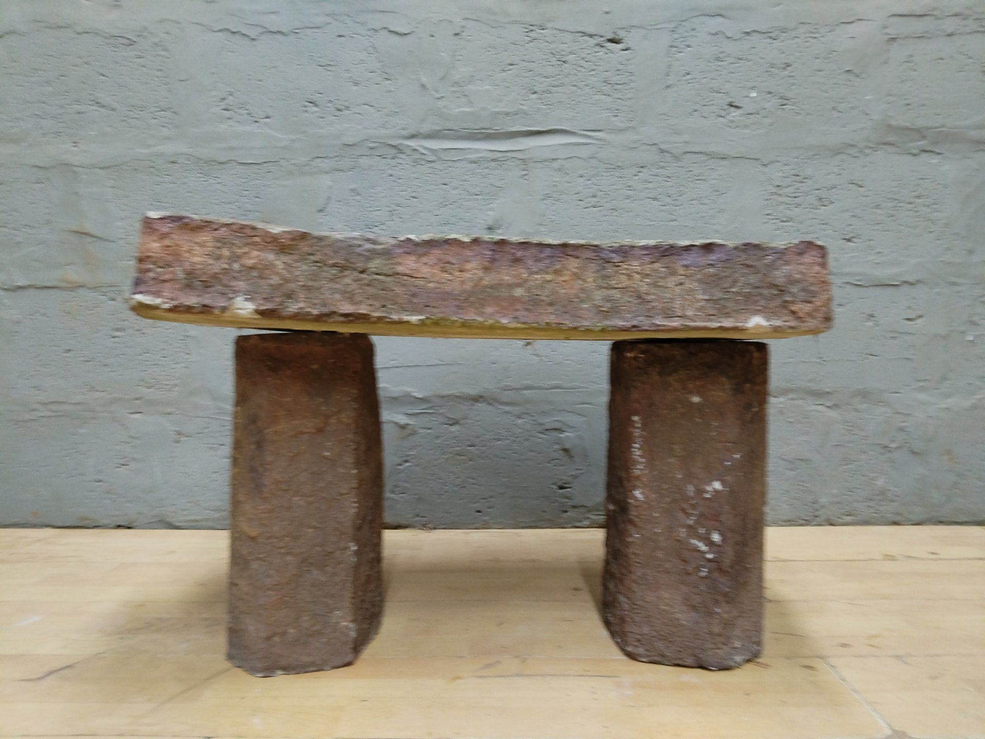 Reclaimed curved concrete top with two supports — architectural/garden salvage (91 × 46 × 52 cm)