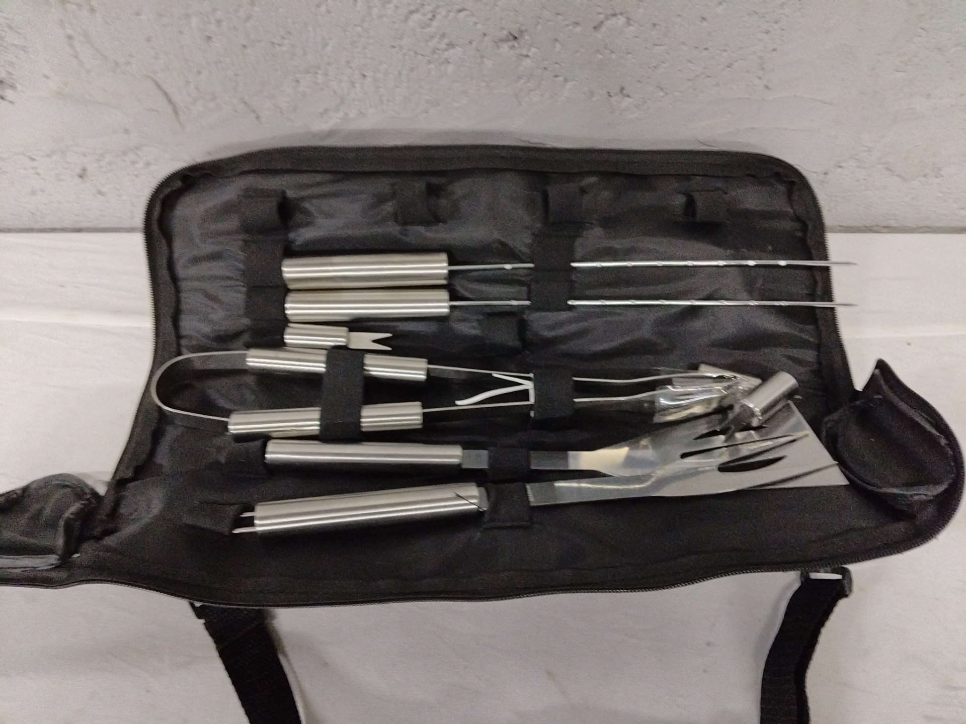 Stainless-steel BBQ / grill tool set in zip carry case — 8 tools (used, some items missing)