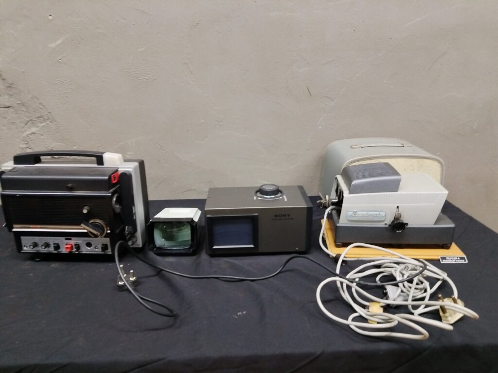 Mixed lot vintage film/TV viewers & adapters — Sony VCR‑4 telecine adaptor, Paximat projector, Halina Paramount viewer, Chinon unit (not working)