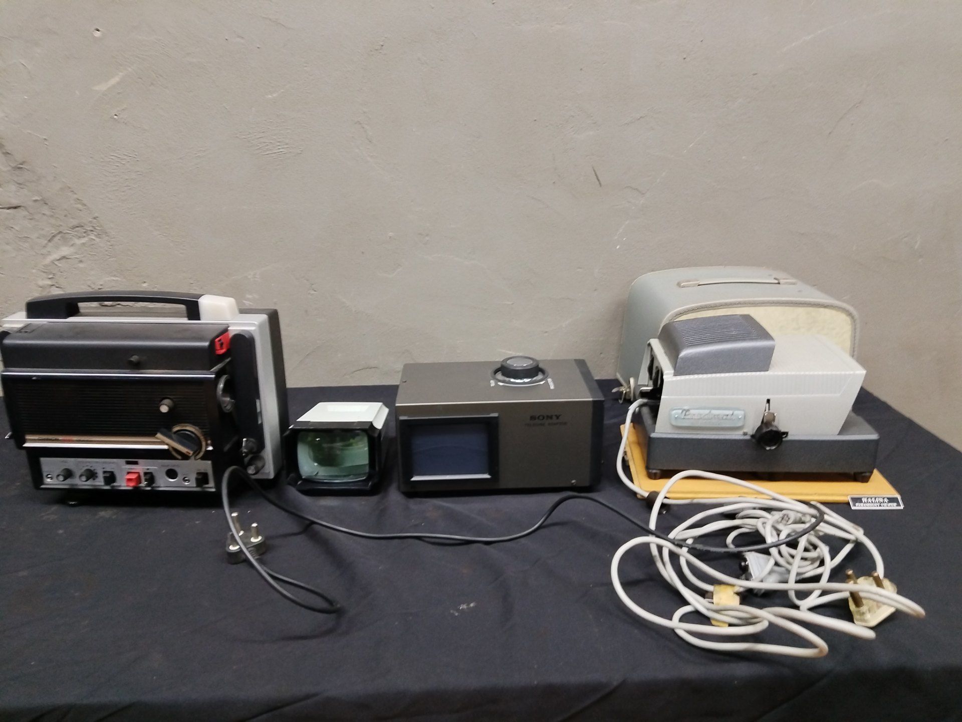 Mixed lot vintage film/TV viewers & adapters — Sony VCR‑4 telecine adaptor, Paximat projector, Halina Paramount viewer, Chinon unit (not working)