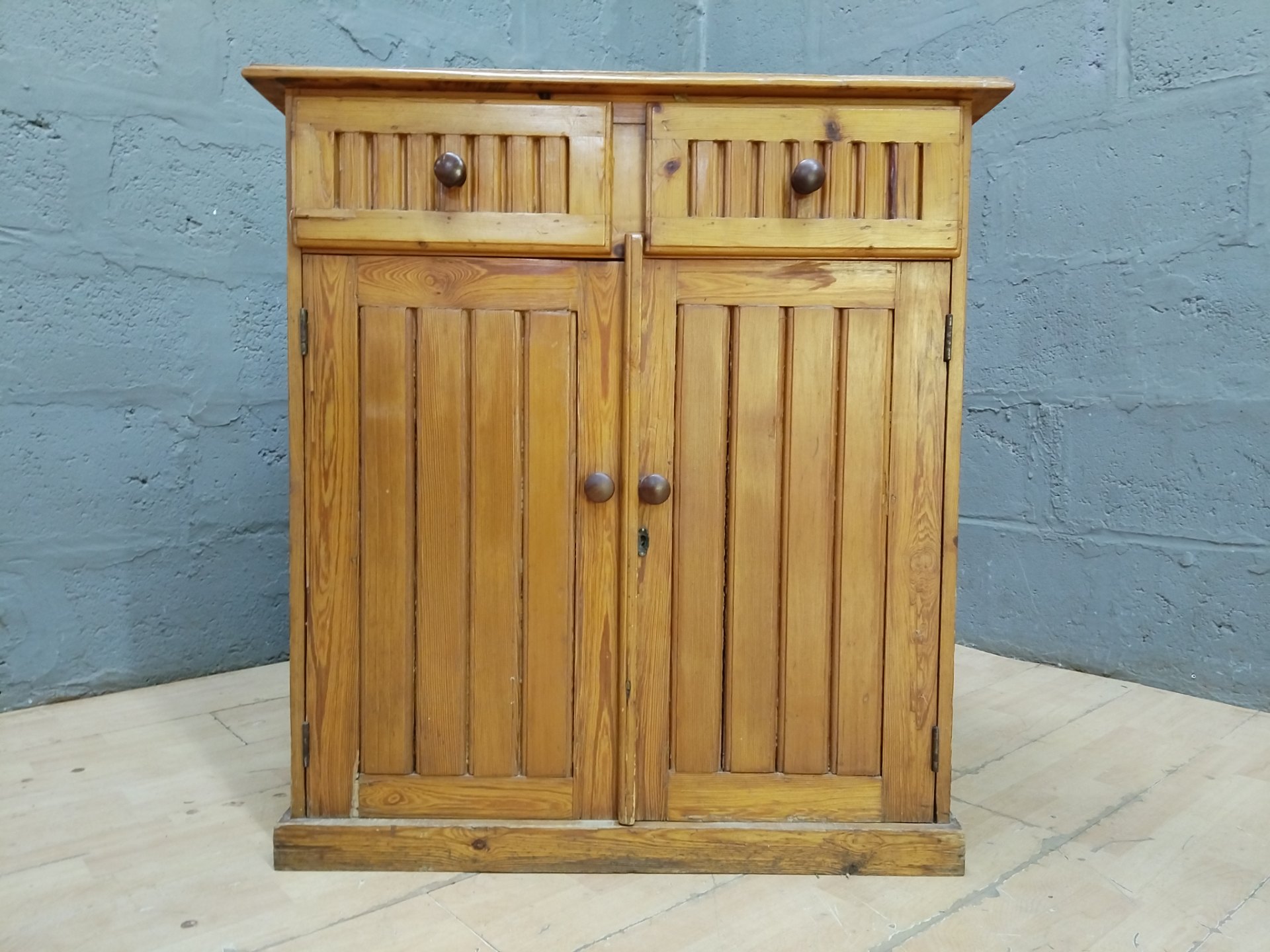 Pine two-drawer, two-door cabinet with fixed shelf (84 x 45 x 96 cm)