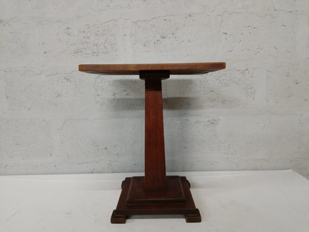Wooden pedestal side table with stepped square base — compact lamp or project table