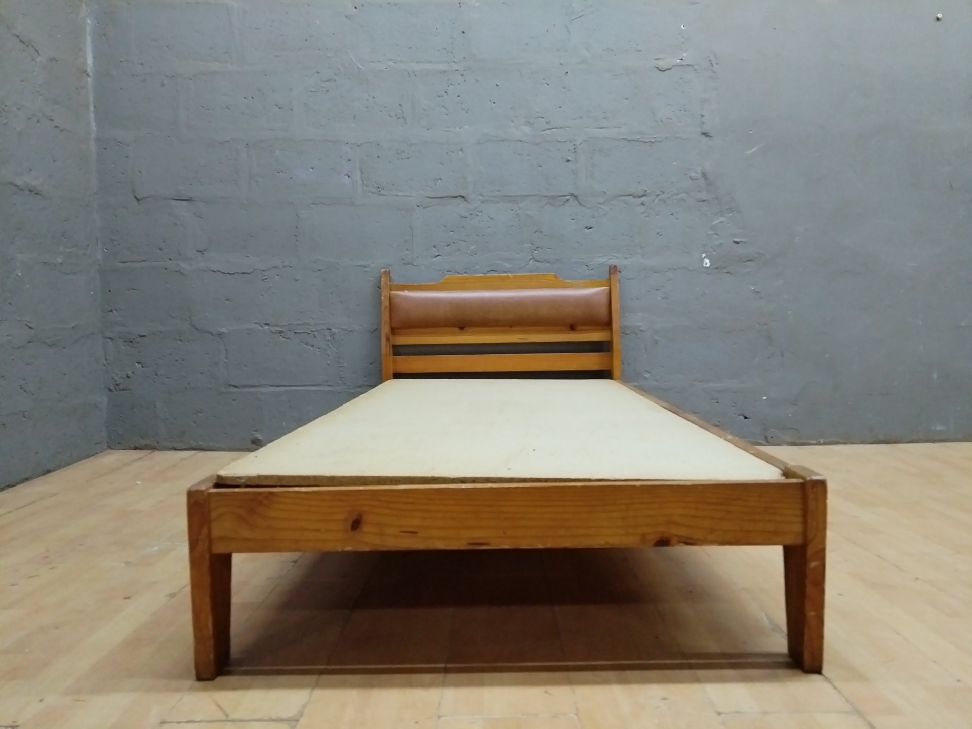 Single wooden bed frame with padded headboard — 98 x 195 x 78 cm — fair used condition