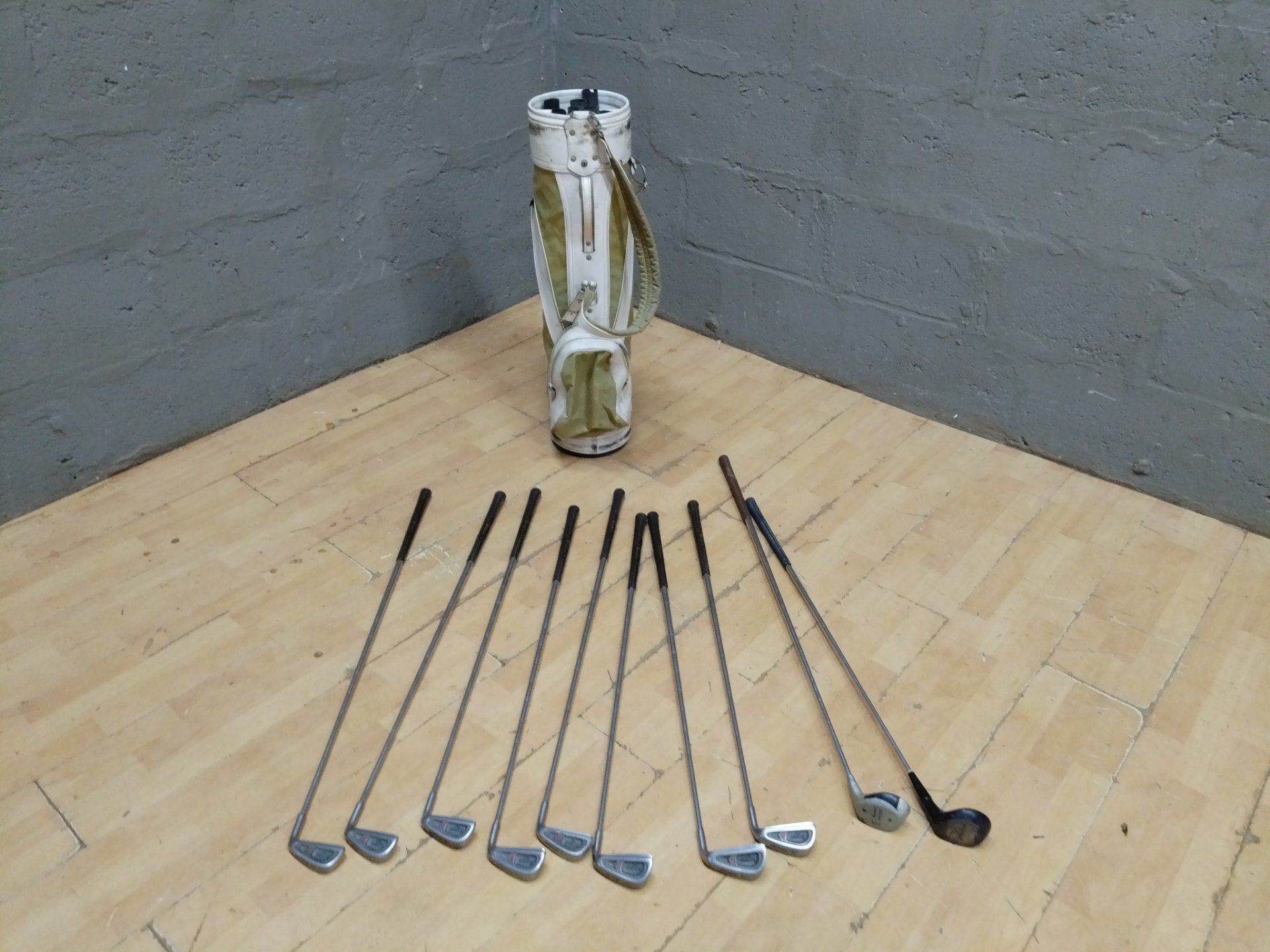 Set of 9 Used Golf Clubs with Carry Bag — Diamond-branded irons, mixed shafts