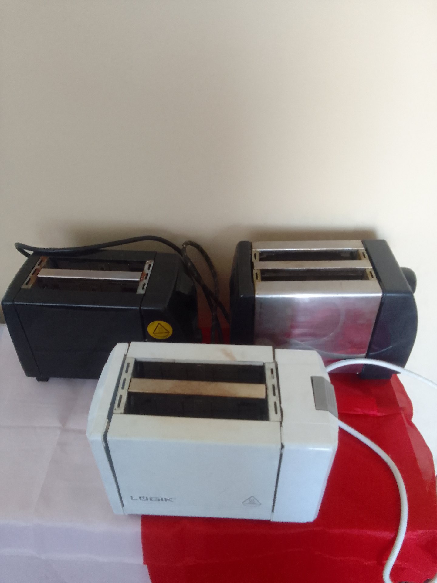 Lot of 3 Assorted 2-Slice Toasters (Logik front unit) — Working, Used, Cosmetic Wear